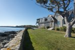 Front lawn with adirondack chairs and incredible ocean views.